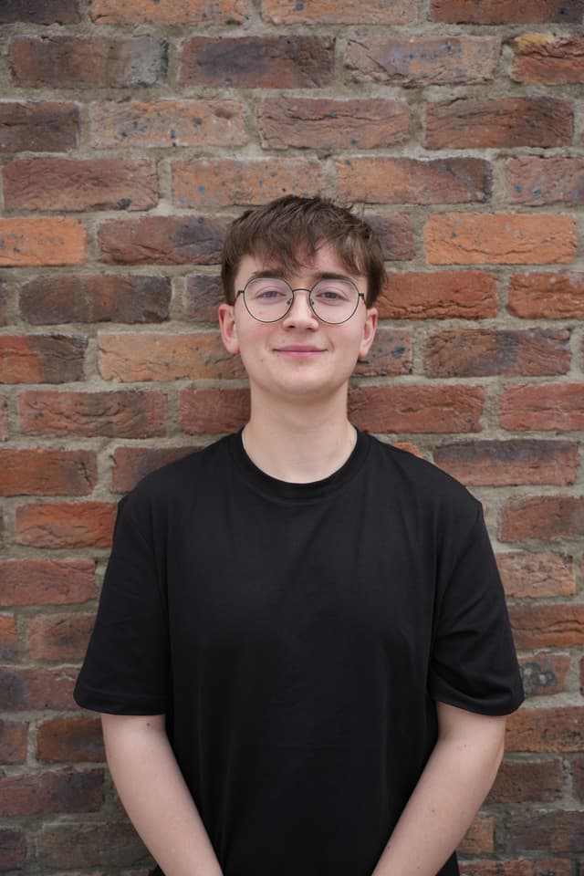 Jamie, brick wall portrait